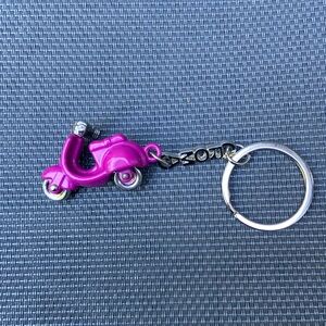 Adorable purple mopad keychain!